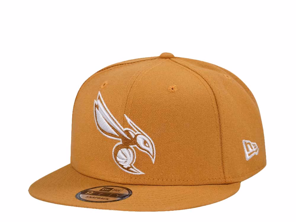 New Era Charlotte Hornets Panama Tan Edition 9Fifty Snapback Hat front
