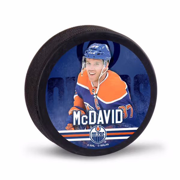 Connor McDavid Edmonton Oilers NHL Player Puck view 1