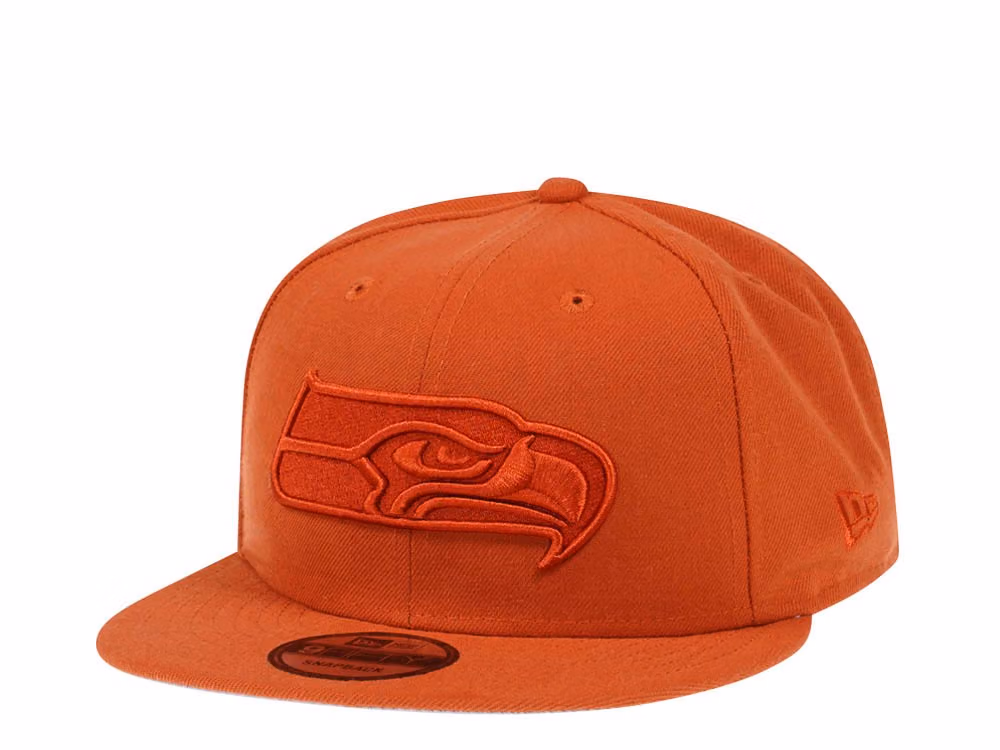 New Era Seattle Seahawks Rust Orange Edition 9Fifty Snapback Hat front