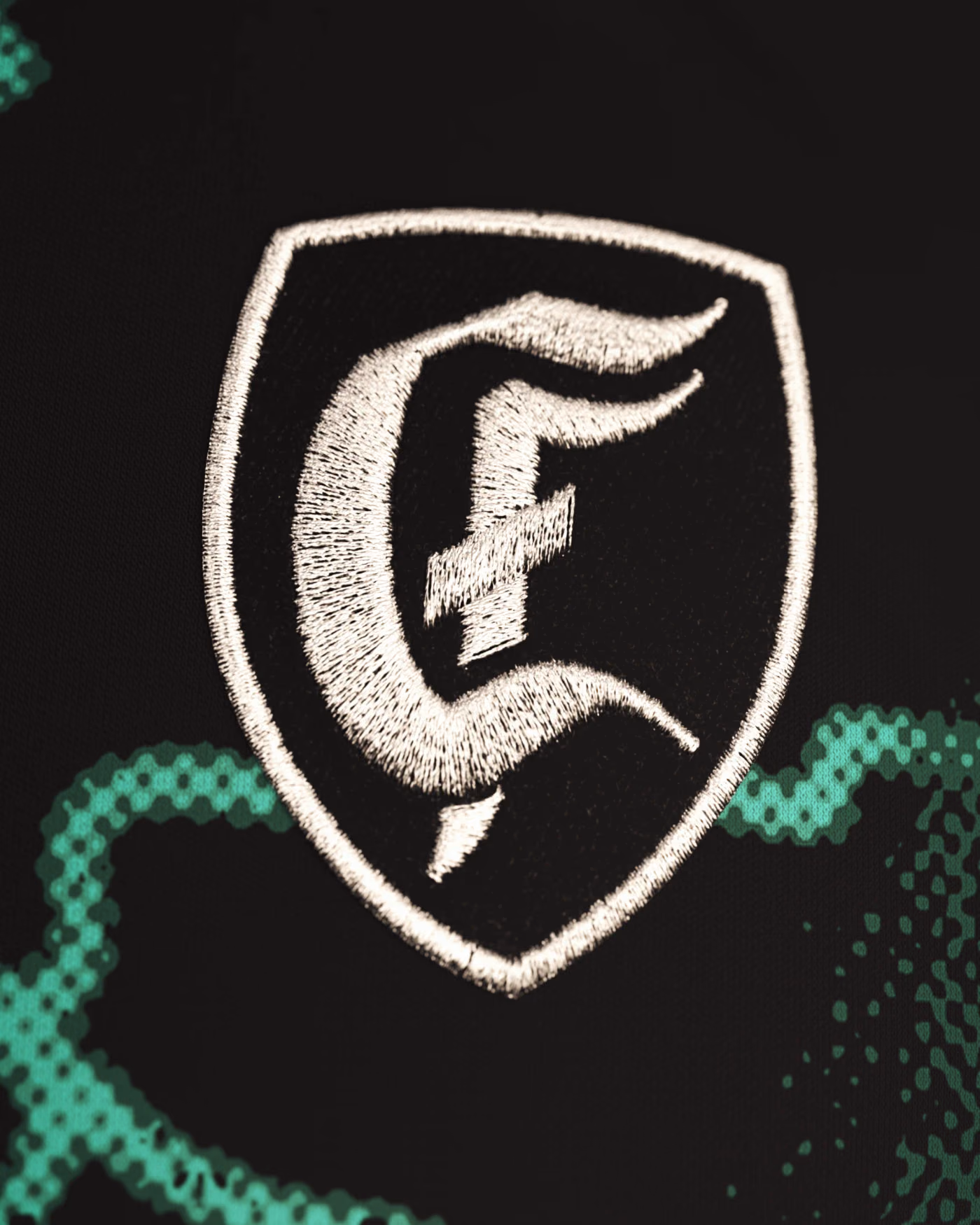 Jersevo Custom Personalized Der Kaiser - Number 4 Jersey crest detail